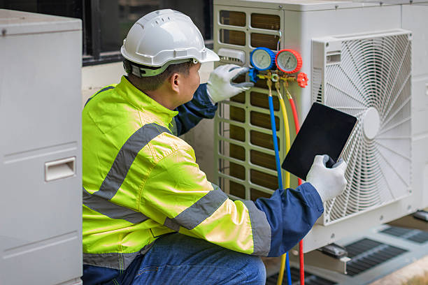 Professional Ac Installation technician working in Woodville, CA